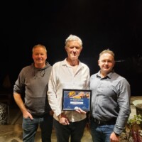 L R Gavin Magrath Area Manager Shane Tell Queenstown Manager and Simon Elliotte Regional GM presenting Shane with his 25 years of service